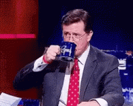 stephen-colbert-spits-out-water.gif