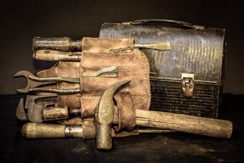 lunch-break-old-vintage-tool-belt-tools-box-48568613.jpg