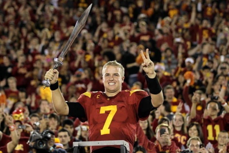 LOS ANGELES, CA - NOVEMBER 26:  Quarterback Matt Barkley #7 of the USC Trojans conducts the band after the game with the UCLA Bruins at the Los Angeles Memorial Coliseum on November 26, 2011 in Los Angeles, California. USC won 50-0.  (Photo by Stephen Dun