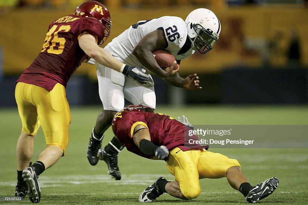 tony-hunt-of-the-penn-state-nittany-lions-runs-over-trumaine-banks-of-picture-id72112122