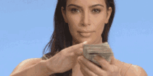 kim-kardashian-money.gif