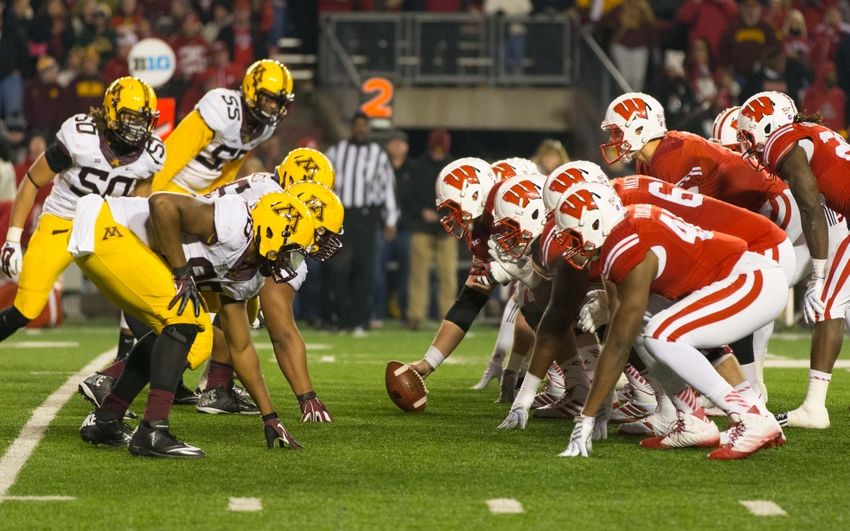 8249530-ncaa-football-minnesota-wisconsin-850x531